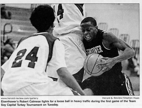 Eisenhower's Robert Calmese fights for loose ball